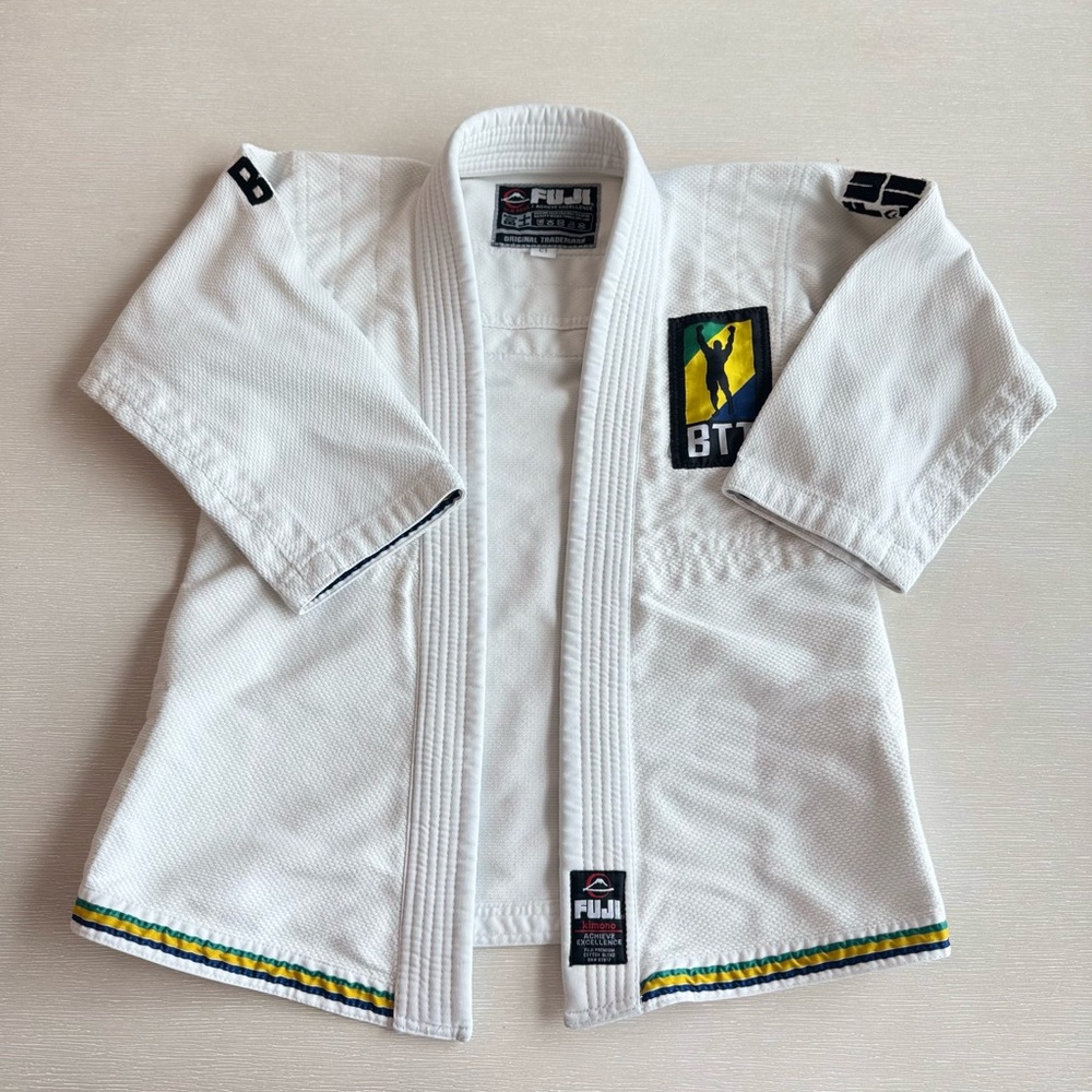 White Martial Arts Top with Yellow and Green Trim